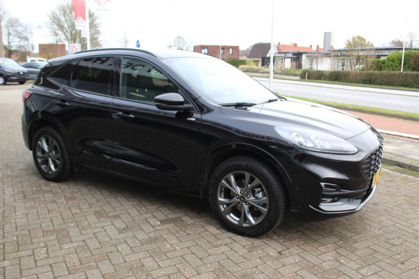 Ford Kuga 2.5-225pk Plug-in Hybrid ST-Line X. Hybride rijden voor een reële prijs ! Adaptive Cruise Control, Stoel- en voorraamverwarming, Climate Control, Metallic lak, Camera v+a, Elektr. achterklep, Side- en lane assist etc.