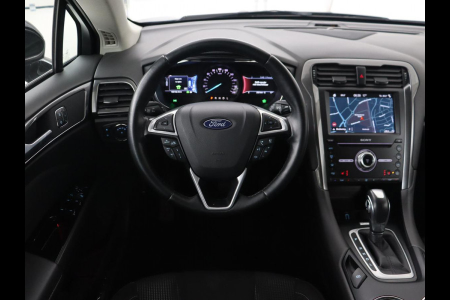 Ford Mondeo 2.0 IVCT HEV Titanium | Adaptive cruise | Stoelverwarming | Camera | Full LED | Carplay | Navigatie | Dodehoek detectie | Keyless | Park Assist | Climate control | Getint glas