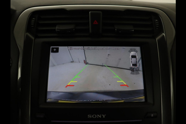 Ford Mondeo 2.0 IVCT HEV Titanium | Adaptive cruise | Stoelverwarming | Camera | Full LED | Carplay | Navigatie | Dodehoek detectie | Keyless | Park Assist | Climate control | Getint glas