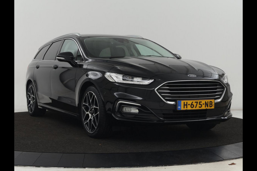 Ford Mondeo 2.0 IVCT HEV Titanium | Adaptive cruise | Stoelverwarming | Camera | Full LED | Carplay | Navigatie | Dodehoek detectie | Keyless | Park Assist | Climate control | Getint glas