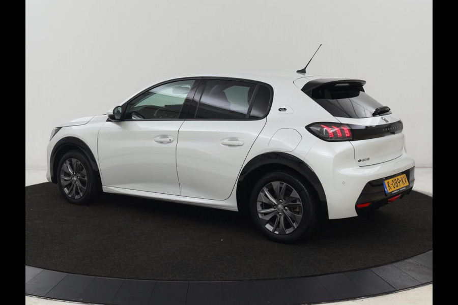 Peugeot e-208 EV Allure 50 kWh | Camera | Carplay | Half leder | Keyless | Navigatie | Full LED | Parkeerhulp | DAB | Getint glas | Climate control | Cruise control