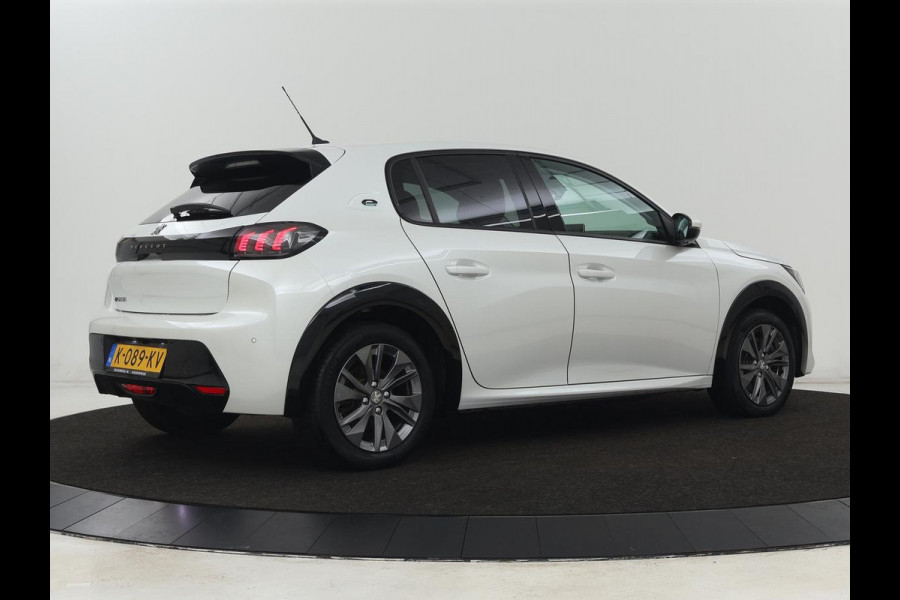Peugeot e-208 EV Allure 50 kWh | Camera | Carplay | Half leder | Keyless | Navigatie | Full LED | Parkeerhulp | DAB | Getint glas | Climate control | Cruise control