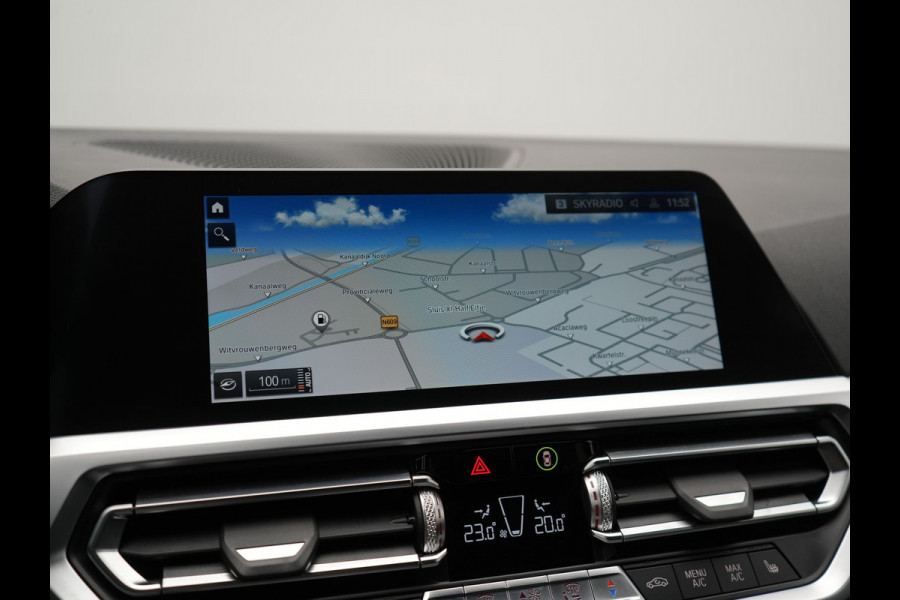 BMW 3 Serie Touring 330i Sportline 259pk Dealer O.H. | Trekhaak Af Fabriek | Lederen Sportstoelen Verwarmd | Apple Carplay | Sfeerverlichting | Cruise Control | Navigatie | Virtual | 18"L.M |