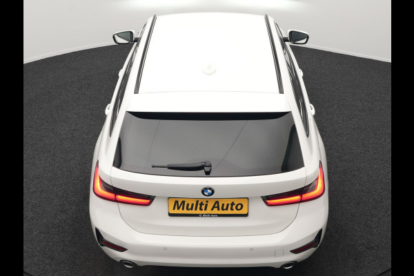 BMW 3 Serie Touring 330i Sportline 259pk Dealer O.H. | Trekhaak Af Fabriek | Lederen Sportstoelen Verwarmd | Apple Carplay | Sfeerverlichting | Cruise Control | Navigatie | Virtual | 18"L.M |
