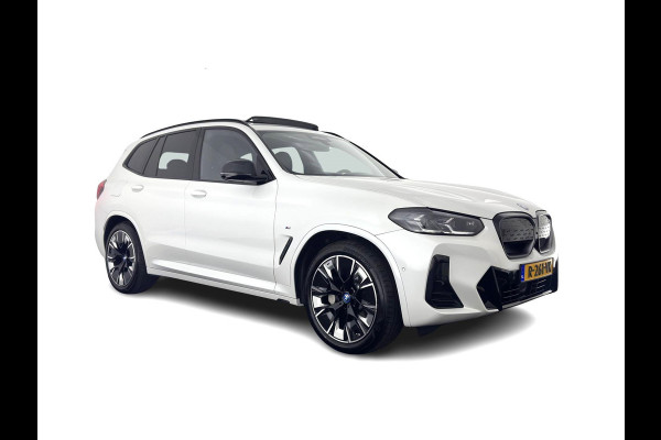 BMW iX3 M-Sportpack High Executive 80 kWh [3-Fase] {SOH-98%} (INCL-BTW) *PANO | LUXURY-LEATHER | HEAD-UP | ADAPTIVE-CRUISE | HEATED-SPORTSEATS | KEYLESS | SHIFT-PADDLES | AMBIENT-LIGHT | BLIND-SPOT | FULL-LED |  MEMORY-PACK | DIGI-COCKPIT | NAVI-FULLMA