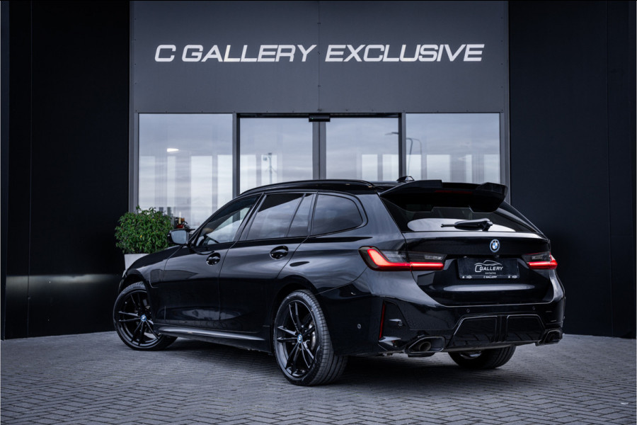 BMW 3 Serie Touring 330e xDrive - M Sport/ performance | Panorama | H&K | Memory | 360 Camera | HUD