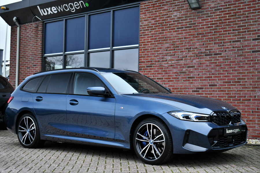 BMW 3 Serie Touring 330e M-Sport LCI-2 Pano Trekh ACC H/K 360 HUD 19inch