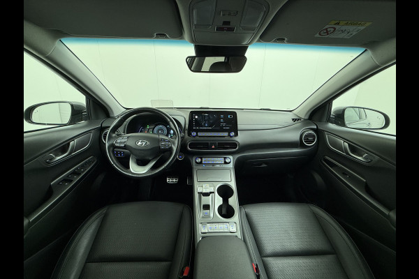 Hyundai Kona EV Premium 64kWh Leer SOH 100% Warmtepomp Krell®-Premium Audio Stoelverwarming+Koeling Camera Apple Carplay Android Auto Head-Up Stuurverwarming Elek.Stoelen Blind Spot Lane Assist VESS 1e Eigenaar Origineel Nederlandse Auto 45.000,-nieuw