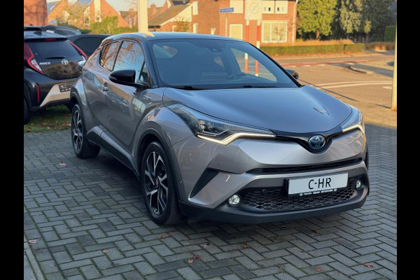 Toyota C-HR 1.8 Hybrid Bi-Tone Plus | JBL, LED Pakket, Dodehoekherkenning, Navigatie, Parkeersensoren, Stoelverwarming, Keyless, 18 inch