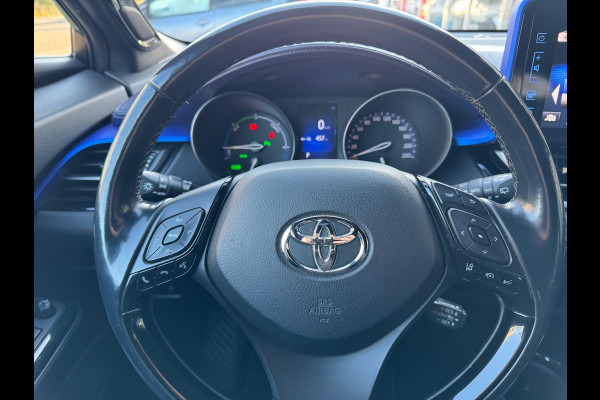 Toyota C-HR 1.8 Hybrid Bi-Tone Plus | JBL, LED Pakket, Dodehoekherkenning, Navigatie, Parkeersensoren, Stoelverwarming, Keyless, 18 inch