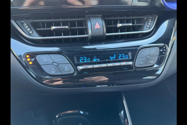 Toyota C-HR 1.8 Hybrid Bi-Tone Plus | JBL, LED Pakket, Dodehoekherkenning, Navigatie, Parkeersensoren, Stoelverwarming, Keyless, 18 inch