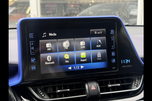 Toyota C-HR 1.8 Hybrid Bi-Tone Plus | Leer, Stoel + Stuurverwarming, Navigatie, Dodehoekherkenning, Parkeersensoren