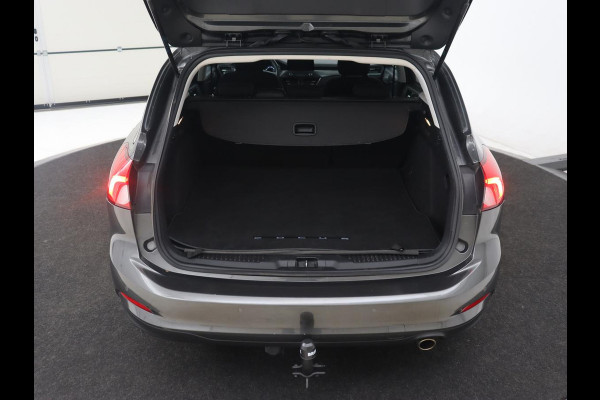 Ford Focus 1.0 EcoBoost Titanium | Trekhaak | Stoelverwarming | Adaptive cruise | Carplay | Navigatie | Stuurverwarming | Keyless | Full LED | B&O Sound | Climate control