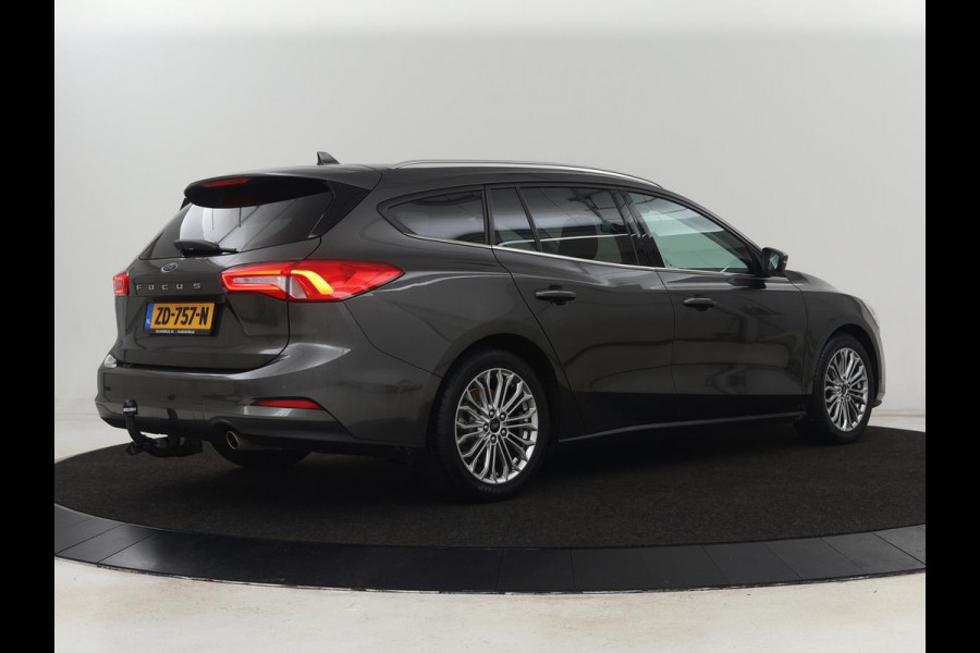 Ford Focus 1.0 EcoBoost Titanium | Trekhaak | Stoelverwarming | Adaptive cruise | Carplay | Navigatie | Stuurverwarming | Keyless | Full LED | B&O Sound | Climate control
