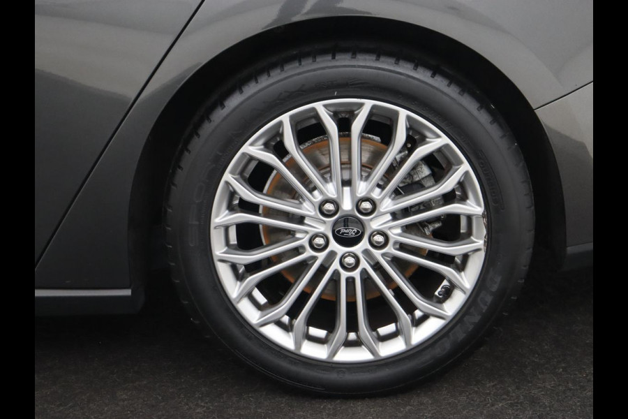 Ford Focus 1.0 EcoBoost Titanium | Trekhaak | Stoelverwarming | Adaptive cruise | Carplay | Navigatie | Stuurverwarming | Keyless | Full LED | B&O Sound | Climate control