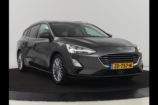 Ford Focus 1.0 EcoBoost Titanium | Trekhaak | Stoelverwarming | Adaptive cruise | Carplay | Navigatie | Stuurverwarming | Keyless | Full LED | B&O Sound | Climate control