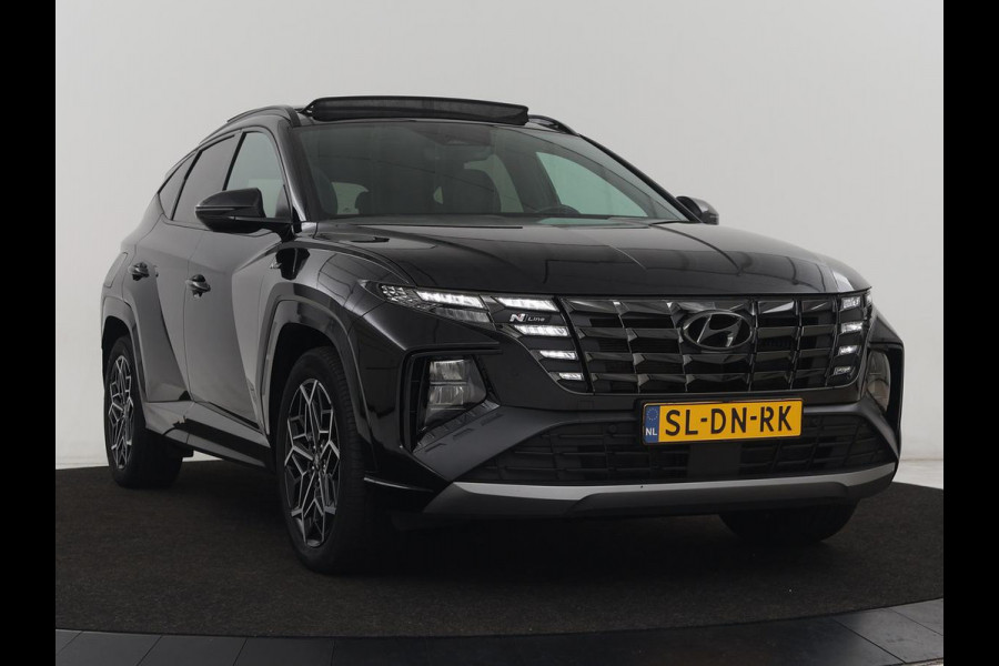 Hyundai Tucson 1.6 T-GDI PHEV N Line Sky 4WD | Panoramadak | Stoelverwarming | Leder/Alcantara | Camera | Adaptive cruise | Carplay | Full LED | Stuurverwarming | Keyless | Plug In