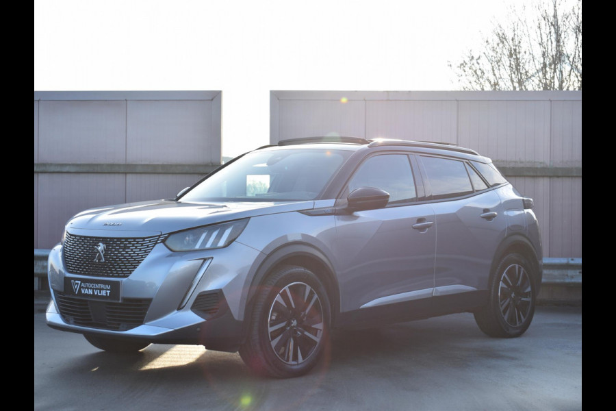 Peugeot e-2008 EV Allure Pack 50 kWh SCHUIF- KANDELDAK | NAVI & CARPLAY | ACHTERUITRIJCAMERA MET SENSOREN | E.C.C. |