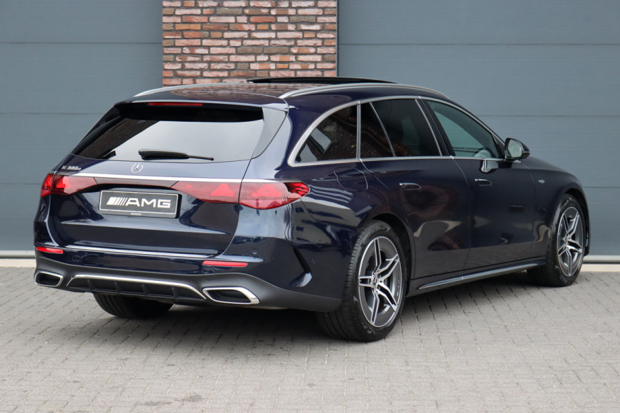 Mercedes-Benz E-Klasse Estate 300 e Premium+ AMG Line | Airmatic | Hyperscreen | Distronic+ | Memory | Massage | Burmester | Stoelventilatie | 3D-Display | HUD | Verwarmd Stuurwiel | Trekhaak | Digital Light |