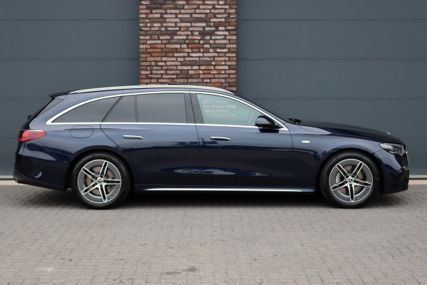 Mercedes-Benz E-Klasse Estate 300 e Premium+ AMG Line | Airmatic | Hyperscreen | Distronic+ | Memory | Massage | Burmester | Stoelventilatie | 3D-Display | HUD | Verwarmd Stuurwiel | Trekhaak | Digital Light |