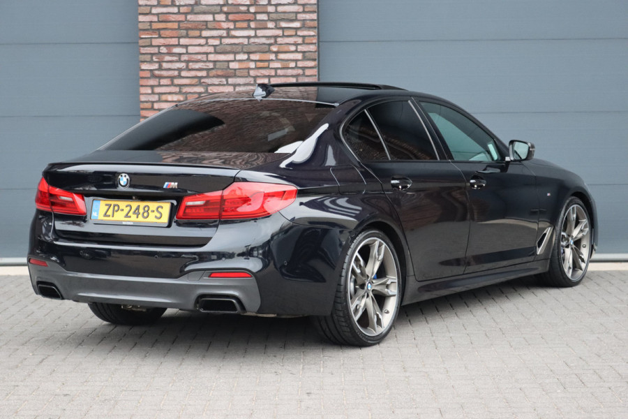 BMW 5 Serie M550d xDrive High Executive | Schuifdak | Bowers&Wilkins | ACC | Trekhaak | Entertainment Achter | Parfumering | Stoelventilatie | HUD | Massage | Standverwarming | Zonnerollo's | Display Key | Aerodynamicapakket |