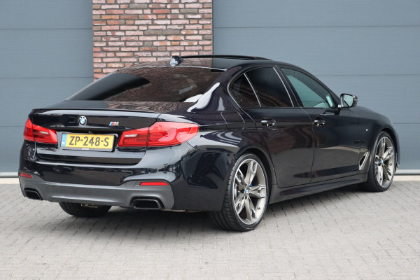BMW 5 Serie M550d xDrive High Executive | Schuifdak | Bowers&Wilkins | ACC | Trekhaak | Entertainment Achter | Parfumering | Stoelventilatie | HUD | Massage | Standverwarming | Zonnerollo's | Display Key | Aerodynamicapakket |