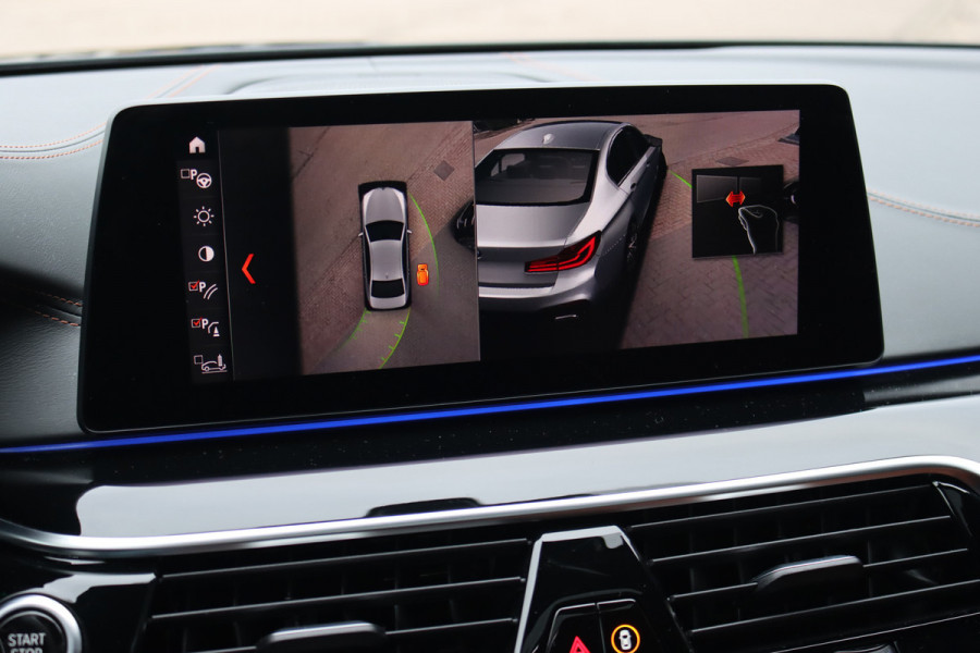 BMW 5 Serie M550d xDrive High Executive | Schuifdak | Bowers&Wilkins | ACC | Trekhaak | Entertainment Achter | Parfumering | Stoelventilatie | HUD | Massage | Standverwarming | Zonnerollo's | Display Key | Aerodynamicapakket |
