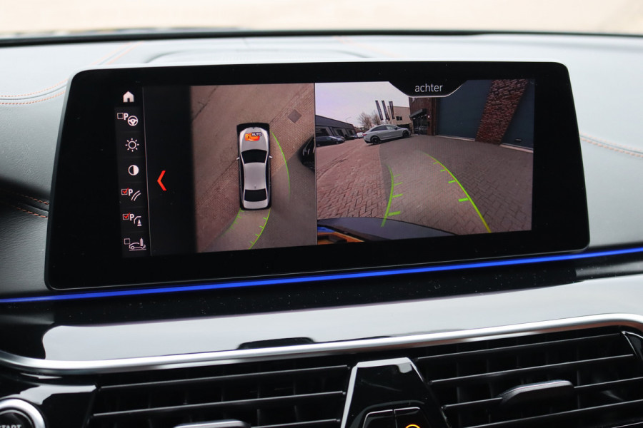BMW 5 Serie M550d xDrive High Executive | Schuifdak | Bowers&Wilkins | ACC | Trekhaak | Entertainment Achter | Parfumering | Stoelventilatie | HUD | Massage | Standverwarming | Zonnerollo's | Display Key | Aerodynamicapakket |