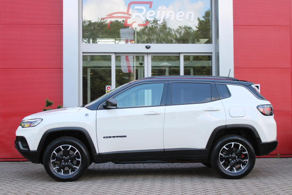Jeep Compass 4xe 240PK PHEV TRAILHAWK AUTOMAAT | NAVIGATIE | ACHTERUIRIJ  CAMERA | DRAADLOOS APPLE CARPLAY / ANDROID AUTO | DIGITALE COCKPIT | LED KOPLAMPEN / ACHTERLICHTEN | LED MIST LAMPEN | 17" OFF-ROAD LICHTMETALEN VELGEN | ALL SEASON BANDEN | DRAADLOOS LADEN | ADAPTIVE CRUISE / CRUISE CONTROL | TREKHAAK | 4 WIELAANDRIJVING | PARKEERSENSOREN VOOR / ACHTER |
