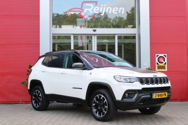 Jeep Compass 4xe 240PK PHEV TRAILHAWK AUTOMAAT | NAVIGATIE | ACHTERUIRIJ  CAMERA | DRAADLOOS APPLE CARPLAY / ANDROID AUTO | DIGITALE COCKPIT | LED KOPLAMPEN / ACHTERLICHTEN | LED MIST LAMPEN | 17" OFF-ROAD LICHTMETALEN VELGEN | ALL SEASON BANDEN | DRAADLOOS LADEN | ADAPTIVE CRUISE / CRUISE CONTROL | TREKHAAK | 4 WIELAANDRIJVING | PARKEERSENSOREN VOOR / ACHTER |