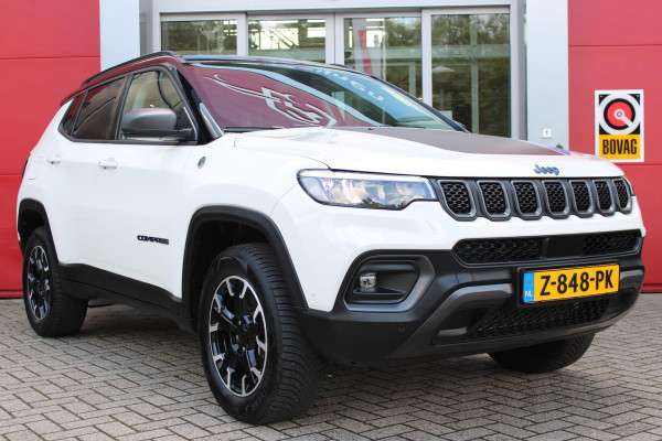 Jeep Compass 4xe 240PK PHEV TRAILHAWK AUTOMAAT | NAVIGATIE | ACHTERUIRIJ  CAMERA | DRAADLOOS APPLE CARPLAY / ANDROID AUTO | DIGITALE COCKPIT | LED KOPLAMPEN / ACHTERLICHTEN | LED MIST LAMPEN | 17" OFF-ROAD LICHTMETALEN VELGEN | ALL SEASON BANDEN | DRAADLOOS LADEN | ADAPTIVE CRUISE / CRUISE CONTROL | TREKHAAK | 4 WIELAANDRIJVING | PARKEERSENSOREN VOOR / ACHTER |