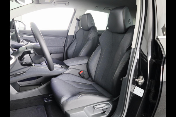 Škoda Elroq 85 Business Edition Tour 286 pk | Trekhaak | Adaptive Cruise | Blind Spot | Stoelverwarming | Donkere ramen