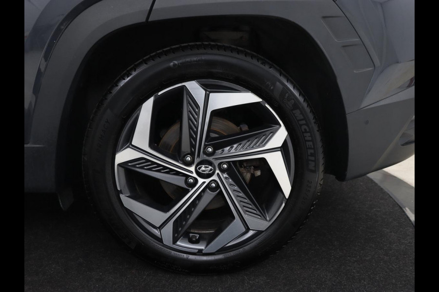 Hyundai Tucson 1.6 T-GDI PHEV Premium Sky 4WD | Panoramadak | Stoelverntilatie | Leder | 360 Camera | Adaptive cruise | Memory | Achterbankverwarming | Carplay | Full LED | Navigatie | Plug In