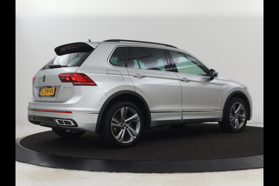 Volkswagen Tiguan 1.4 TSI eHybrid R Line | Matrix LED | Camera | Carplay | Adaptive cruise | 19'' | Navigatie | Park Assist | Virtual Cockpit | Climate control | DAB | Getint glas