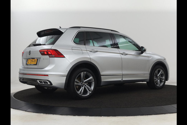 Volkswagen Tiguan 1.4 TSI eHybrid R Line | Matrix LED | Camera | Carplay | Adaptive cruise | 19'' | Navigatie | Park Assist | Virtual Cockpit | Climate control | DAB | Getint glas