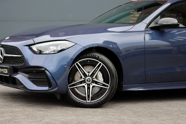 Mercedes-Benz C-Klasse Estate 300 e AMG Line | Distronic | Memory | Panoramadak | Camera | Trekhaak | High Perf. LED | Nightpakket | Sfeerverlichting Premium | Stoelverwarming | Dodehoekassistent |