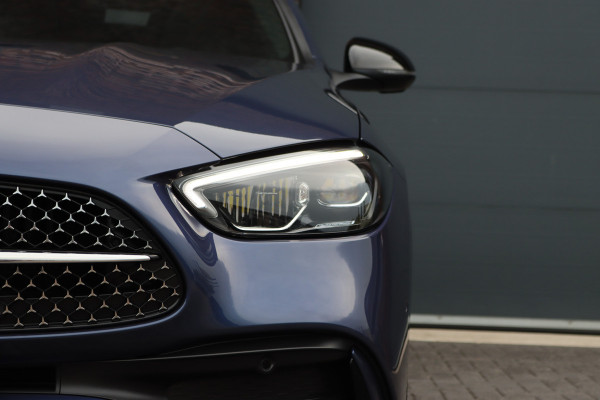 Mercedes-Benz C-Klasse Estate 300 e AMG Line | Distronic | Memory | Panoramadak | Camera | Trekhaak | High Perf. LED | Nightpakket | Sfeerverlichting Premium | Stoelverwarming | Dodehoekassistent |