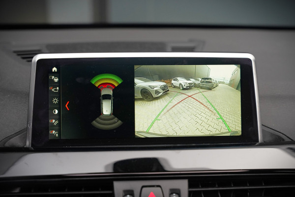 BMW X1 sDrive18i High Executive X Line | Panoramadak | Harman Kardon | Parkeersensoren | Head-Up Display | Leer | Stoelverwarming | Navigatie | Camera | Automaat | Digitale Tellers | Keyless | LED | Cruise Control |