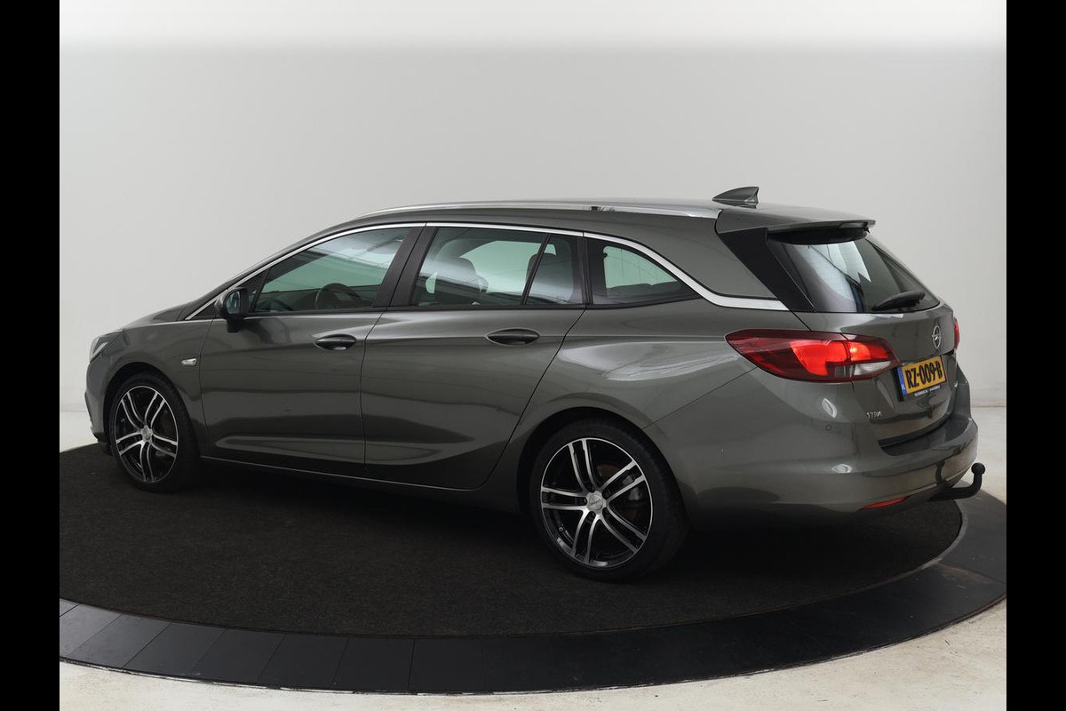 Opel Astra 1.6 CDTI Online Edition | Trekhaak | Carplay | Navigatie | Climate control | Comfortstoelen | 18'' | Parkeerhulp | Cruise control | Bluetooth