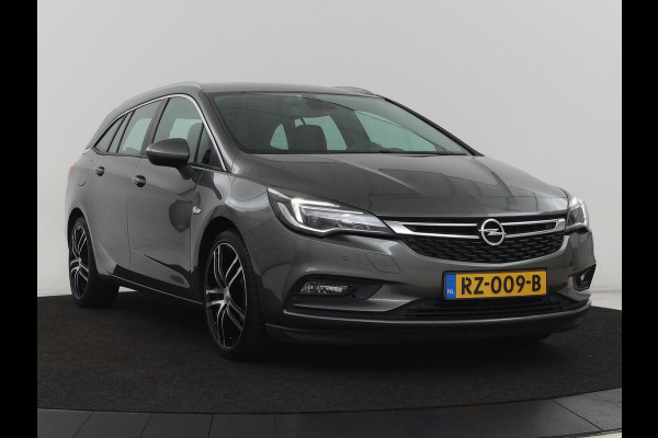 Opel Astra 1.6 CDTI Online Edition | Trekhaak | Carplay | Navigatie | Climate control | Comfortstoelen | 18'' | Parkeerhulp | Cruise control | Bluetooth