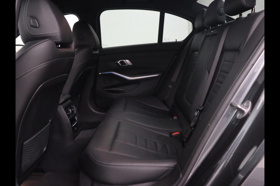 BMW 3-serie 320e M Sport | Leder | Trekhaak | Stoelverwarming | Carplay | Sportstoelen | Laserlicht | Live Cockpit | DAB | Parkeerhulp | Navigatie | Climate control | Bluetooth | Cruise control