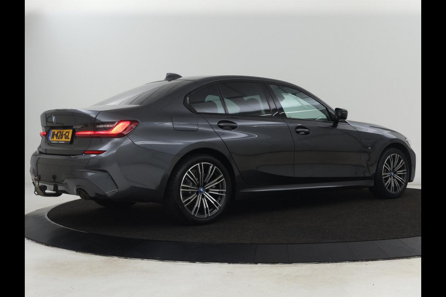 BMW 3-serie 320e M Sport | Leder | Trekhaak | Stoelverwarming | Carplay | Sportstoelen | Laserlicht | Live Cockpit | DAB | Parkeerhulp | Navigatie | Climate control | Bluetooth | Cruise control