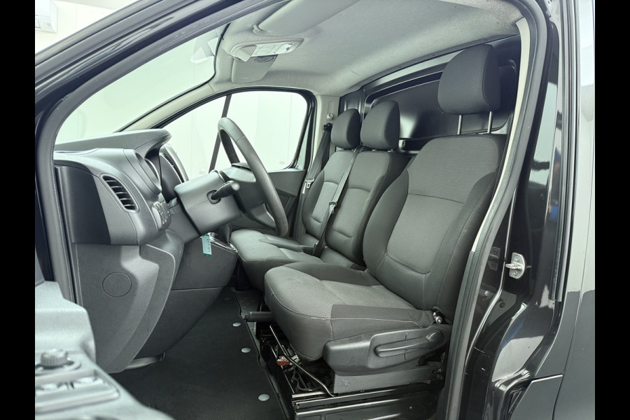 Renault Trafic 2.0DCI 145PK T29 L2H1 Comfort 3-Persoons Trekhaak Apple Carplay Android Navi Airco Cruise Control Bluetooth Lmv Pdc Betonplex Vloer Wandbetimmering Schuifdeur Sidebars Euro 6 Origineel Nederlandse Auto