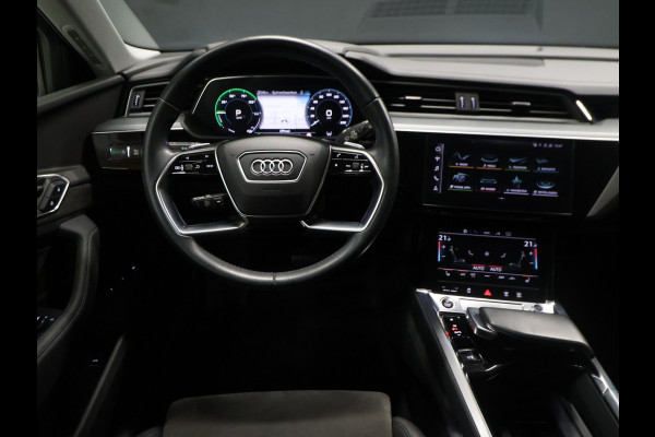 Audi e-tron 55 quattro Business edition Plus 95 kWh [TREKHAAK AFNEEMBAAR, LUCHTVERING, SCHUIFKANTELDAK, MEMORY SEATS, APPLE CARPLAY, ANDROID, SPORTSTOELEN, ADAPTIVE CRUISE, PDC V+A, STOELVERWARMING, NIEUWSTAAT]