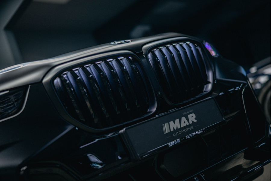 BMW X5 xDrive50e | M uitgevoerd | Trekhaak | Alcantara hemel | Luchtvering | Full PPF in- en exterieur | Skylounge |