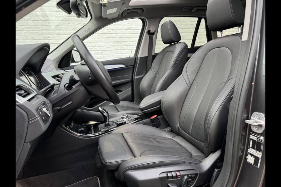 BMW X1 SDrive18i High Executive Cruise Climate control Leer+memory Sfeerverlichting Navigatie Full LED Parkeersensoren