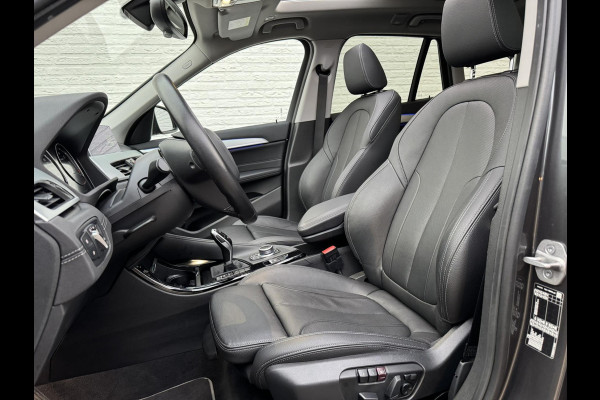 BMW X1 SDrive18i High Executive Cruise Climate control Leer+memory Sfeerverlichting Navigatie Full LED Parkeersensoren