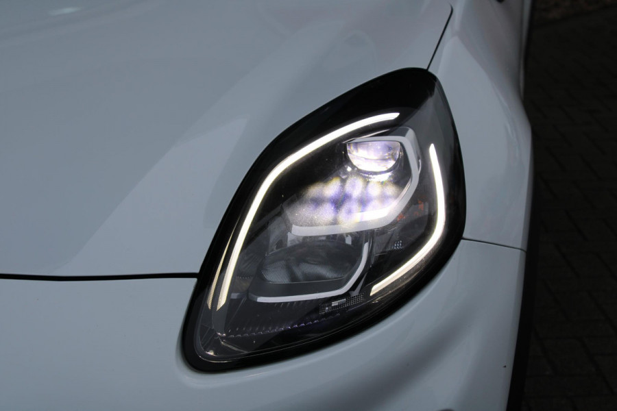 Ford Puma 1.0 EcoBoost 125 PK Hybrid Titanium X | Winterpack | Adaptieve Cruise Control | Massagestoelen | Electrische Achterklep | Camera | Climate Control | Navigatie | PDC V+A | BLIS