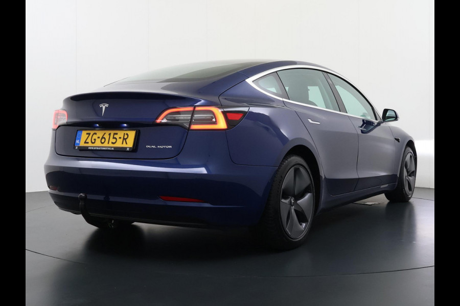 Tesla Model 3 Long Range AWD 75 kWh SOH 88% VAN: €22.900,- VOOR: €20.899,- UW EINDEJAARSVOORDEEL: €2.001,- |AFNEEMBARE TREKHAAK | 750KG TREKGEWICHT | ORIGNEEL NL AUTO | RIJKLAAR MET 12 MND BOVAG GARANTIE |