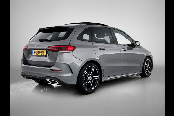Mercedes-Benz B-Klasse 180 Business Solution AMG Panoramadak | Lichtmetalen velgen | MBUX  wide screen | navigatie | Parking support | Sfeerverlichting | Inclusief 24 maanden MB Certified garantie voor Europa.